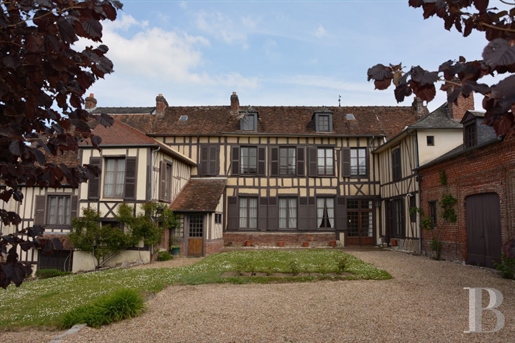 130 km from Paris, in the heart of a historic village, an important 18th century residence on 1300 m