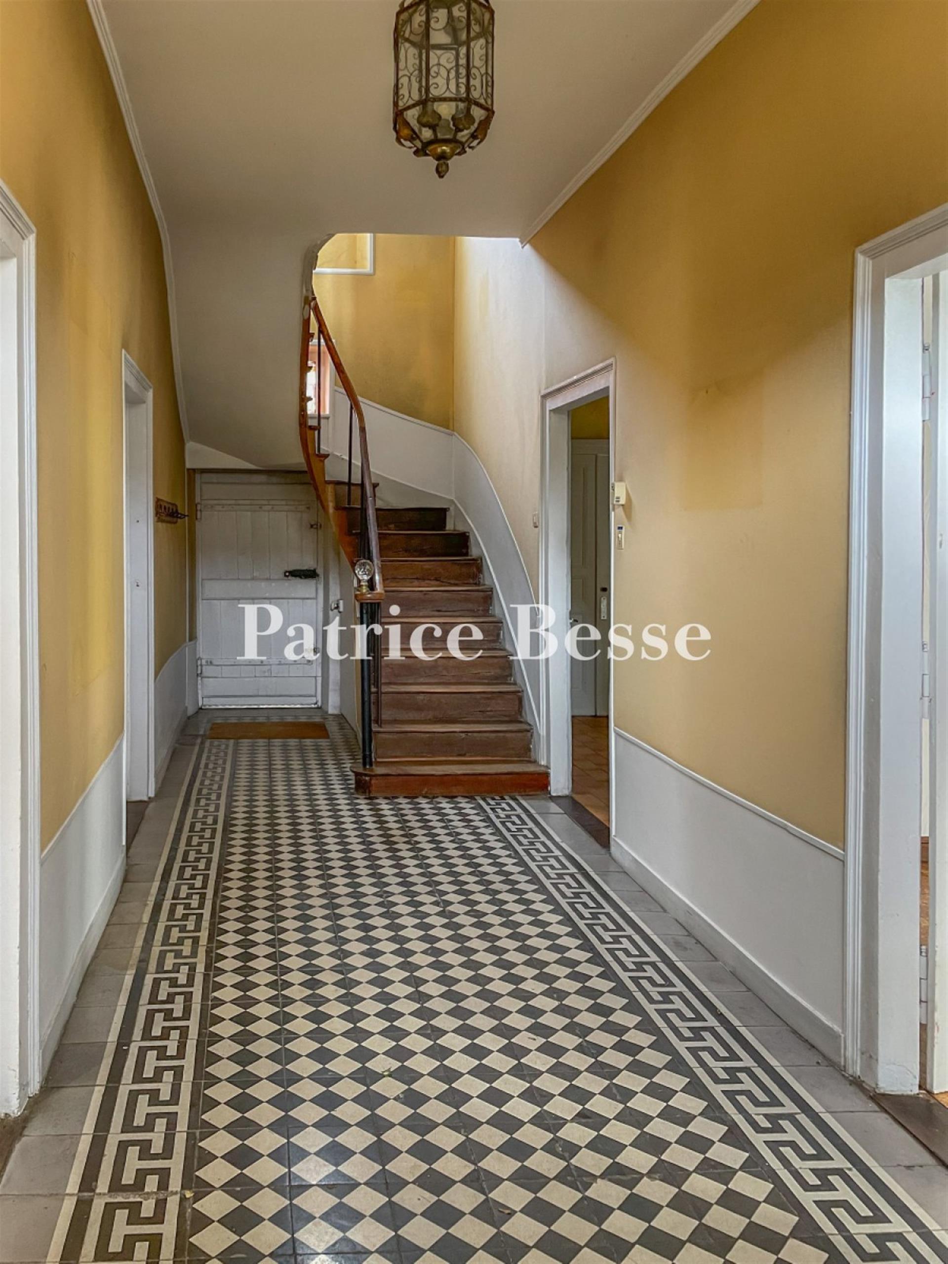 A grand 19th-century house with a vast garden, nestled in the south of France's Mayenne department.
