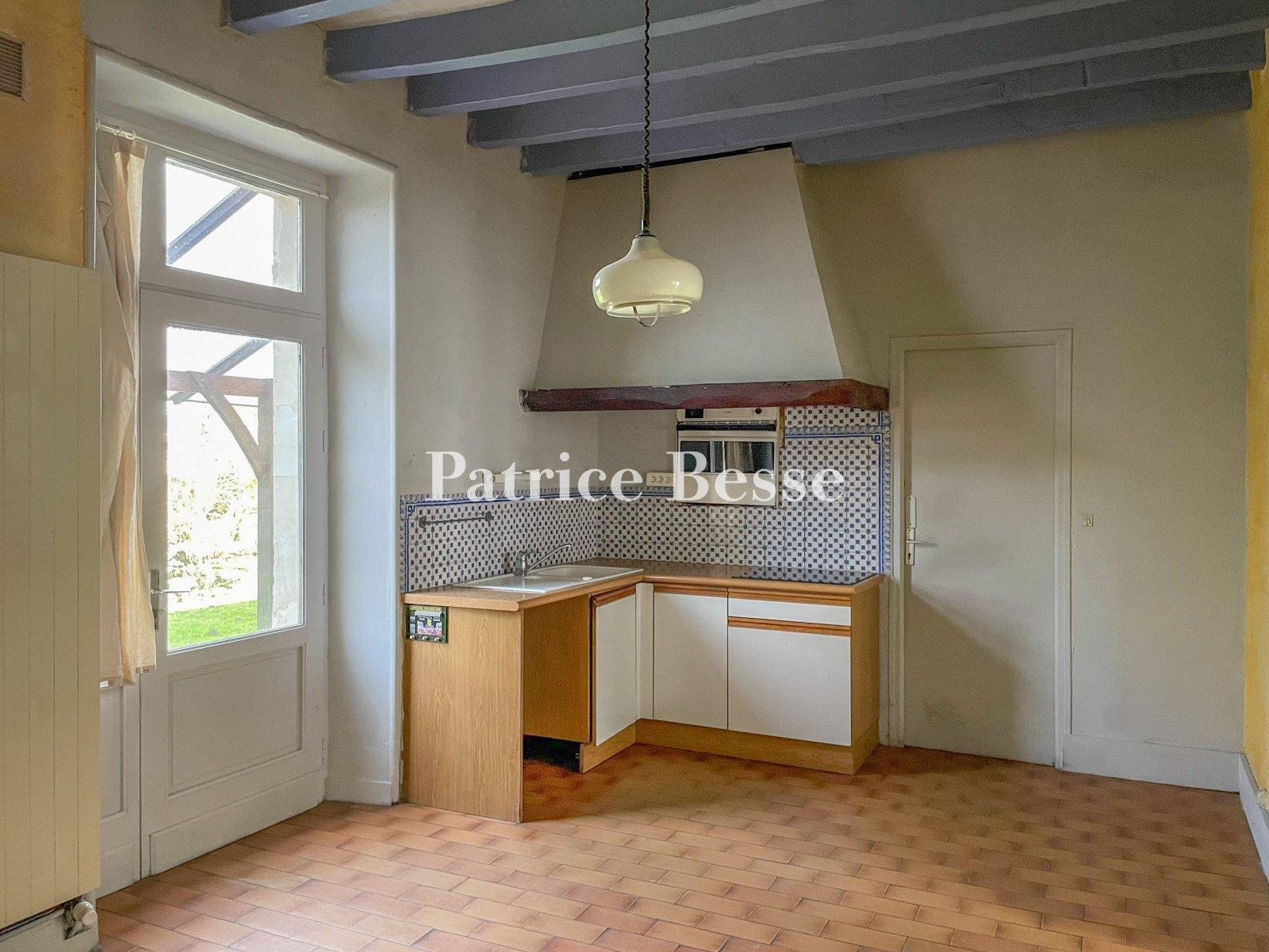 A grand 19th-century house with a vast garden, nestled in the south of France's Mayenne department.