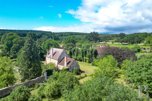 A listed 14th-century monastic guesthouse, with almost 2 hectares of grounds in the Falaise region,