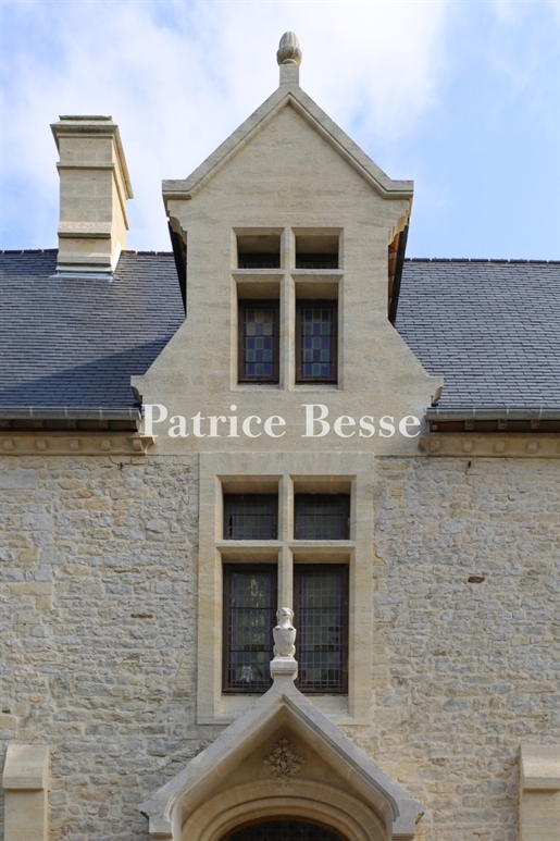 In Normandy, between Bayeux and Port-en-Bessin-Huppain, near to the beaches and main D-Day Landing s