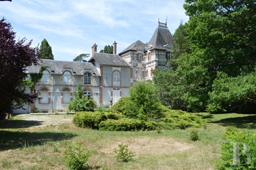 A château and its grounds full of century-old trees bordered by a river 1 5 hours away from Paris, c