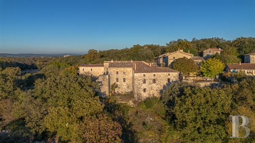 An ancient fortified castle, its gîte and 12 ha of grounds in a hamlet between the Cèze and Ardèche