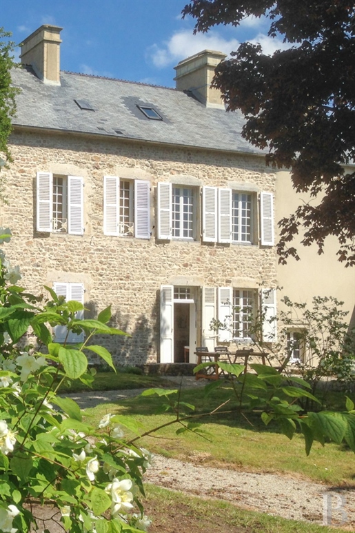 An elegant 18th century residence with outbuildings, swimming pool, pond and approx 6,000 m² of grou