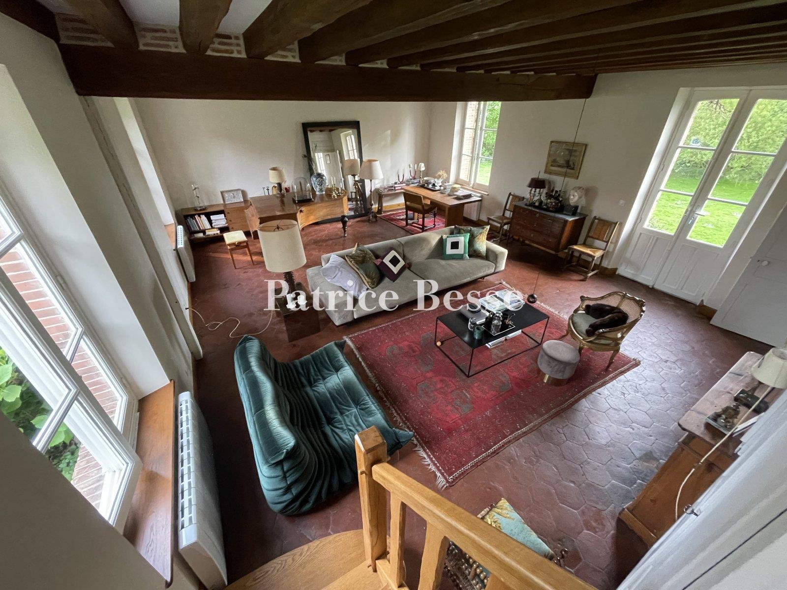 A charming renovated presbytery, its outbuildings, enclosed garden and views of the surrounding fiel