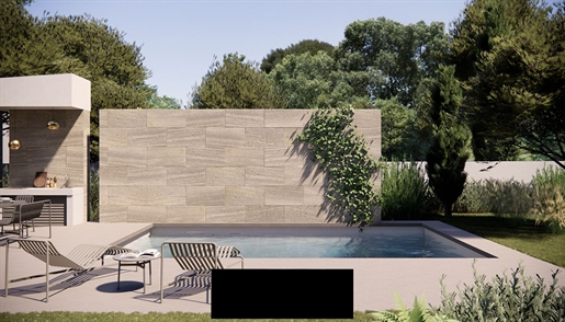 Entdecken Sie diese 187 m2 große High-End-Villa mit Pool und Garten, die zeitgenössischen Luxus in 