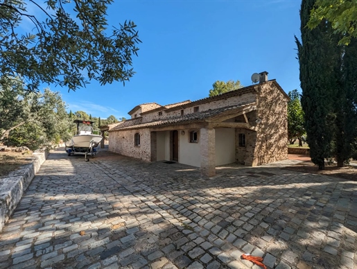 Superb stone property for sale in the town of Les Arcs with an olive grove, many trees and even a po