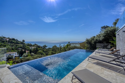 This beautiful new contemporary property offers a breathtaking panoramic sea view from its ultra-dom