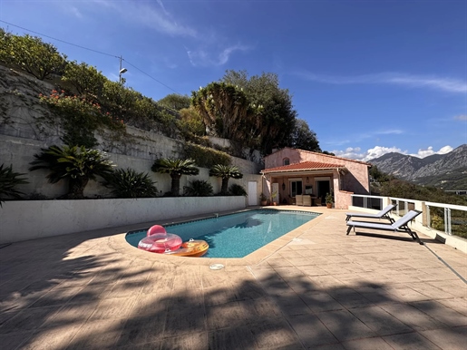In a secure residential area, charming villa set in 4,677 m2 of landscaped gardens with swimming poo