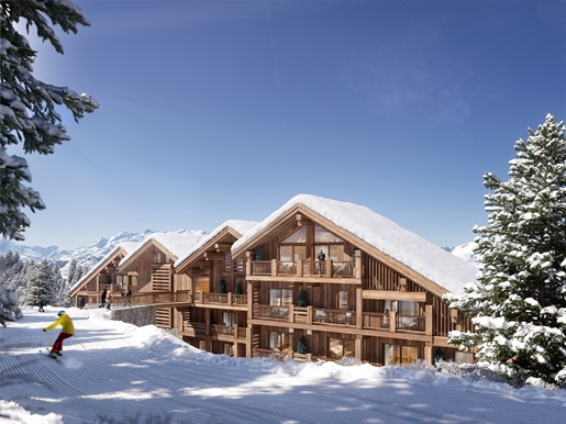 The new Bois des Ours development enjoys a prime location in the Rond-Point des Pistes neighborhood,