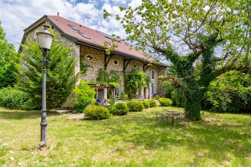 Experience the harmony of privacy and natural beauty in this sumptuous property, nestled in an idyll