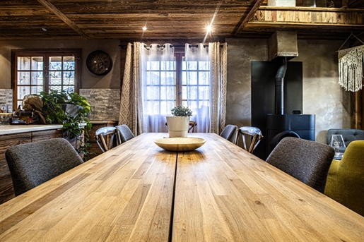 Magnificent 19th century farmhouse, lovingly renovated to showcase the old wood and original roofing