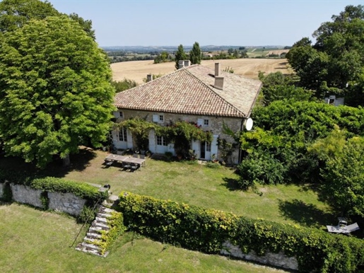 Situated just 10 minutes from Condom, this sublime stone manoir is accessed by a private road and si