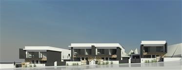 Ensemble de 4 parcelles de terrain, à Sobreda, avec projet de construction de 4 villas.