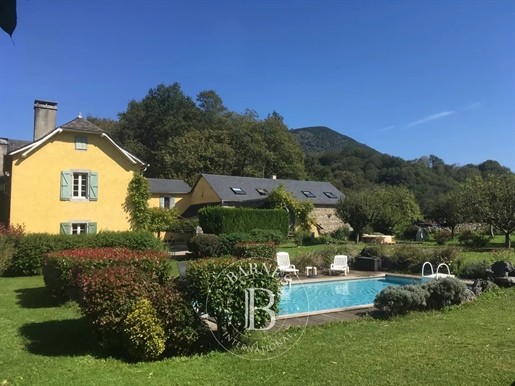 Pretty Farm House And Outbuildings At The Foot Of The Pyrenees