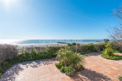 Property located on the seafront with beach access
