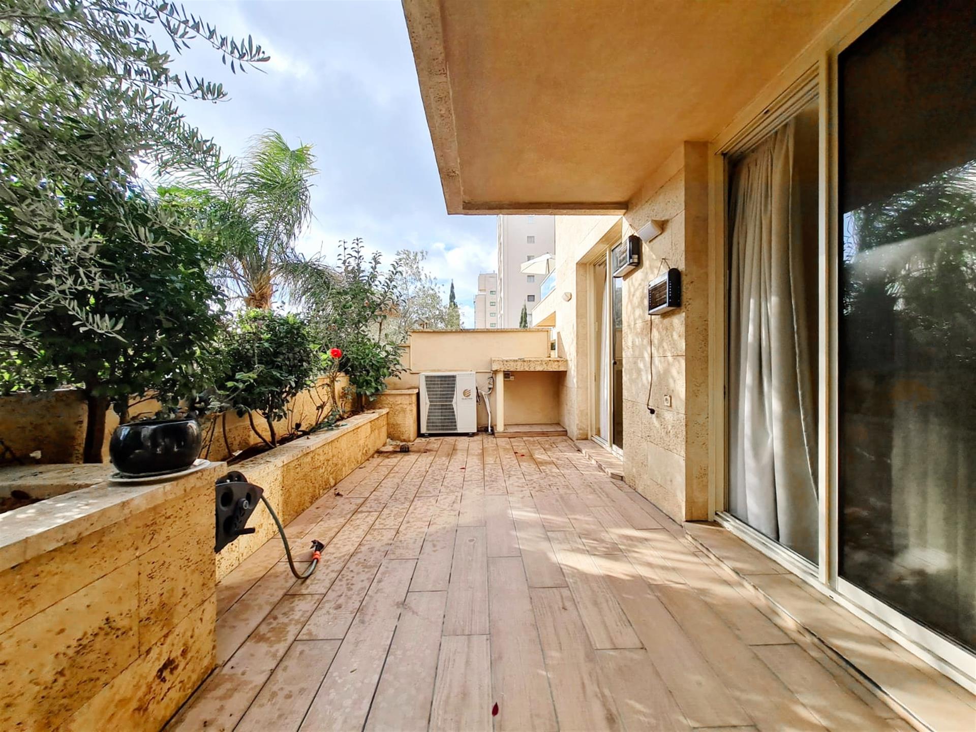 For sale a garden apartment in Villa Mare building, Herzliya Pituach