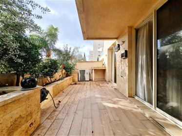 For sale a garden apartment in Villa Mare building, Herzliya Pituach