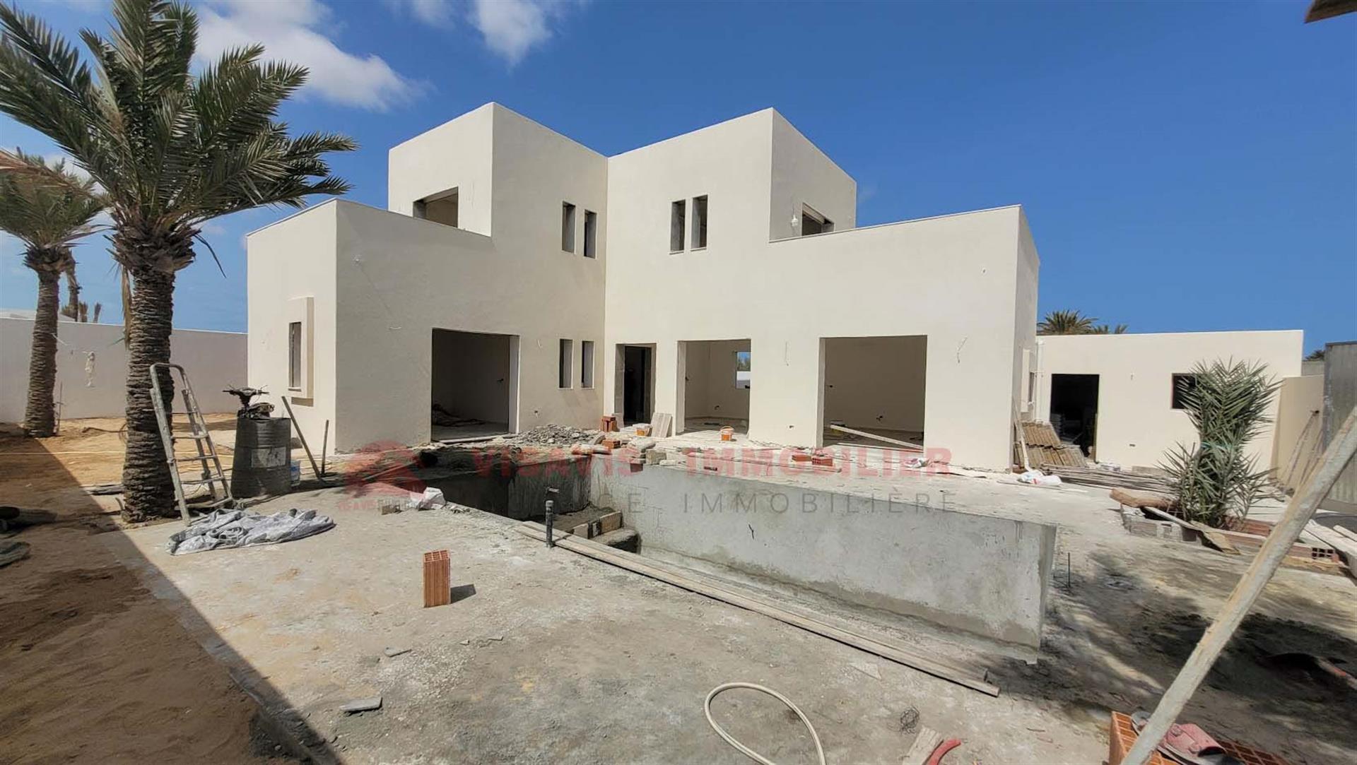 Nová vila na predaj na Djerbe - mestská časť - modrý názov