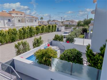 4 bedroom house with swimming pool and large garage in Olhos de Agua