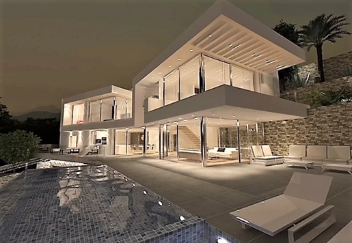 Moderne villa met zeezicht te koop gelegen in El Portet, Moraira