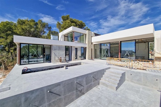 Villa moderna de nueva construcción con vistas al mar en venta en Moraira