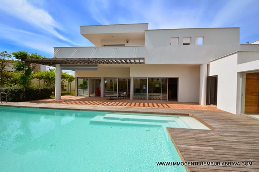 Exclusive and modern, architect's villa with sailboat mooring.