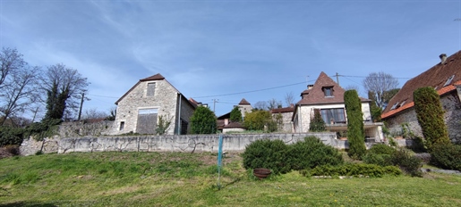 Saint-Sozy - stone house 86 m2 habitable with outbuilding or house to finish renovating of approx. 1