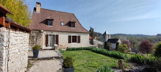 Saint-Sozy - stone house 86 m2 habitable with outbuilding or house to finish renovating of approx. 1