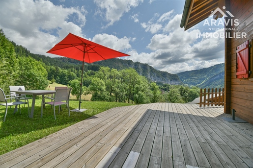 Two adjoining chalets with panoramic views of the mountains and the Aravis Valley