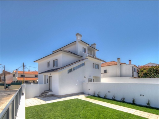 Brand new two-family house at Parede, Cascais, renovated, three bedrooms (two suites) and great outd