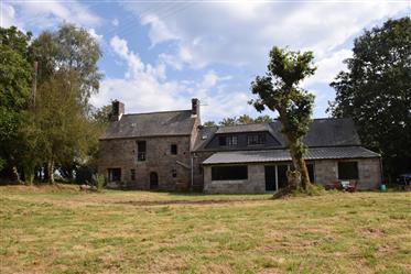 Substantial stone-built 18th century countryside home with solar panels and outbuildings set in 1.7 