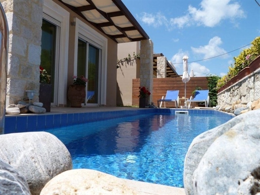 A three-bedroom semi-detached villa with a pool in Nopigia.
