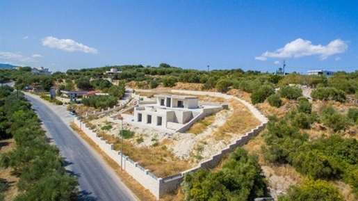 A modern villa with a pool in Almyrida