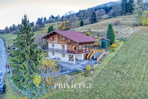 Chalet of 170m2 with 1346m2 of land offering breathtaking views of the Arve valley