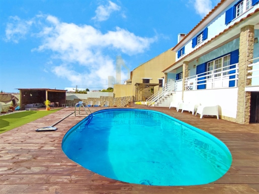 Chalet de 3+2 dormitorios con anexo, piscina, terraza, garaje y vistas al mar en la parroquia de Eri