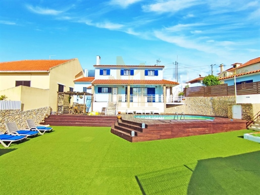 Chalet de 3+2 dormitorios con anexo, piscina, terraza, garaje y vistas al mar en la parroquia de Eri