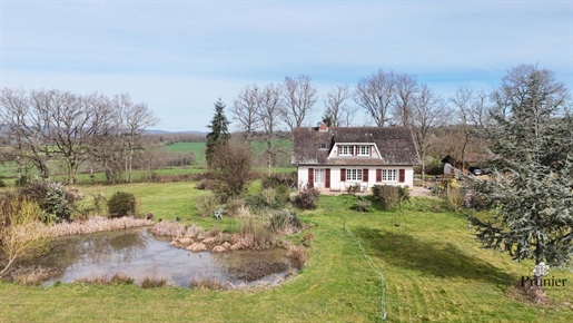 186 m² house on 8,660 m² park with small pond