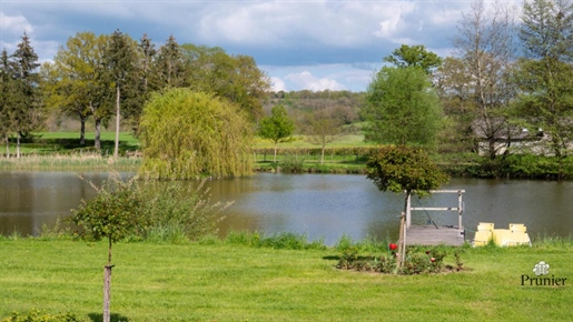 Renovated property on 1 ha 38 fully enclosed with beautiful pond of 0.8 ha