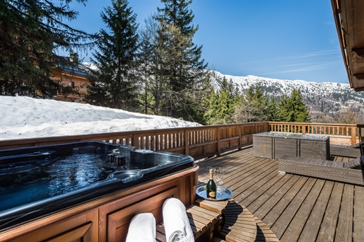 Stunning 7 bedroom chalet, south west facing, close to slopes, superb views located in Meribel (A)