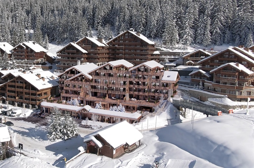 Ski in and out off plan luxury 3 bedroom apartment for sale in Meribel with stunning views