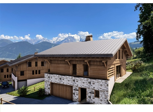 Nouveau chalet sur plan de 5 chambres, exposé sud-est, superbe vue Mont Blanc à Combloux (A)