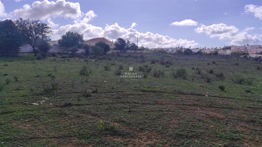 Rustic land of 9000 sq.mtrs with good access, very close to the town of Guia, Algarve shopping and t
