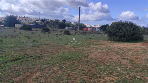 Rustic land of 9000 sq.mtrs with good access, very close to the town of Guia, Algarve shopping and t