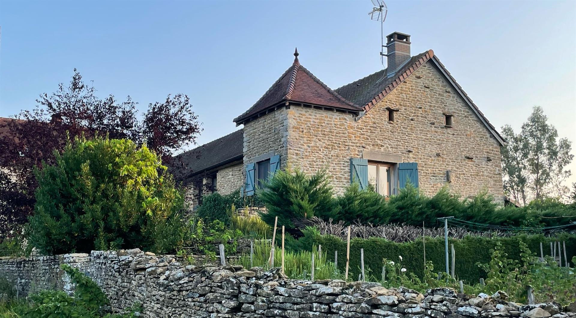 Well restored house on the edge of a pretty village