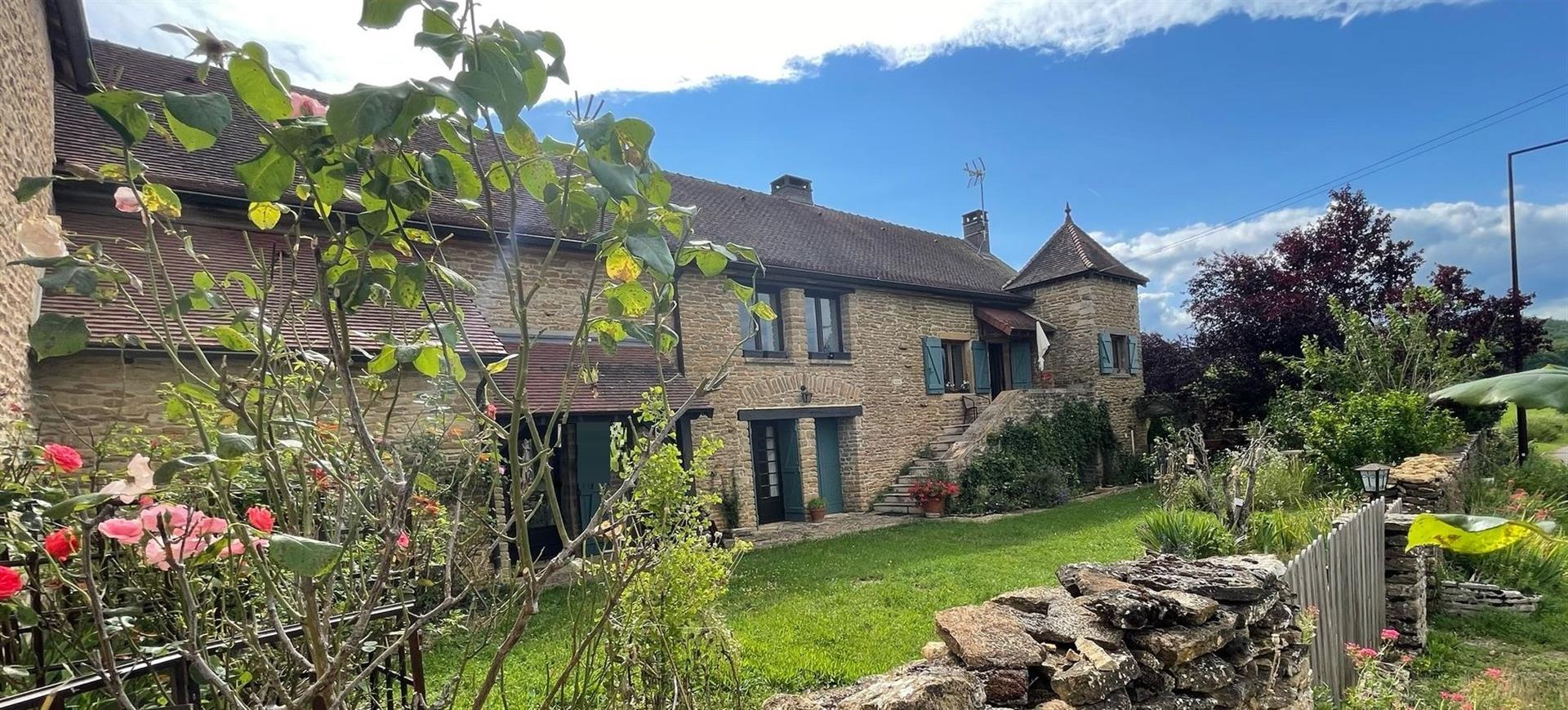 Well restored house on the edge of a pretty village