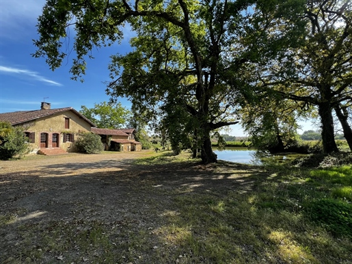Beautiful secluded Gascon farmhouse with outbuildings and woods.