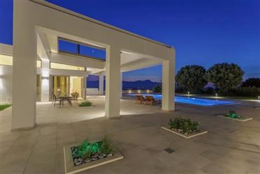 Crete Heraklion  . For sale luxury villa 687 sqm with private pool 77 sqm with unique views .