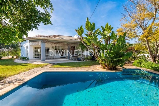 Romantic detached villa with double garage and pool.