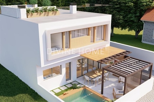 4 bedroom Semi-detached villa under construction with pool in Estombar